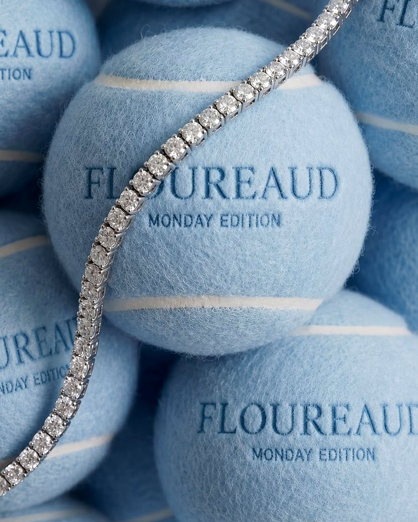The Riviera — an unbroken line of stones over embroidered blue felt